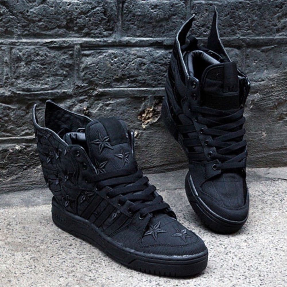 ASAP rocky X Jeremy Scott black flag sneaker.